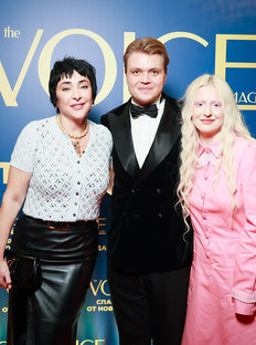 Celebrities Attend Premiere of The VOICE Escapes the New Year